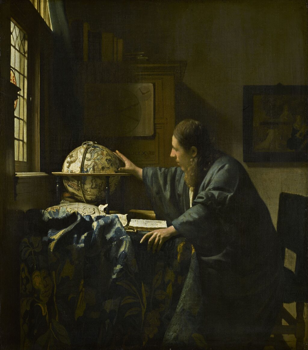 A scholar in a blue robe leans toward a celestial globe by a window, one hand resting on it, an open book on the table in front of him.